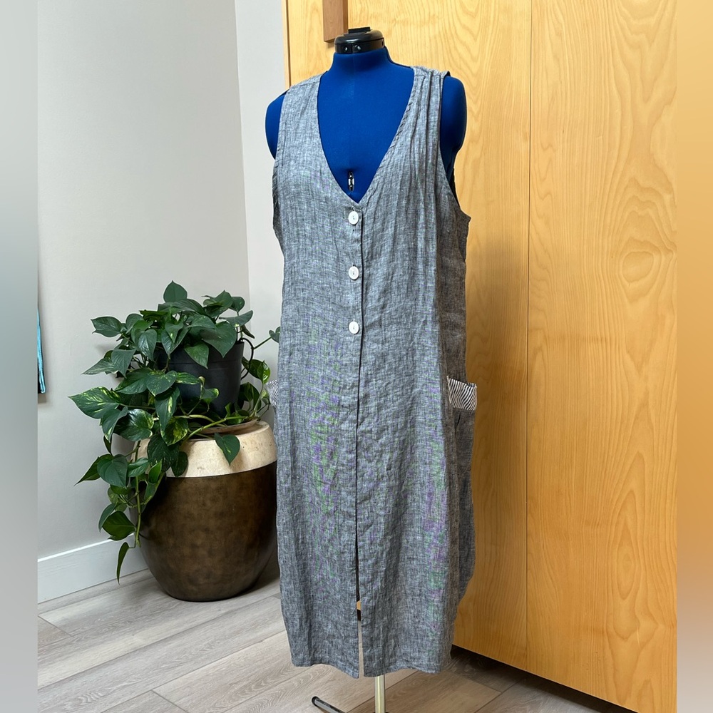 Duster length linen vest.